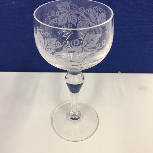 209 - A selection of twelve grape-design, etched wine glasses.