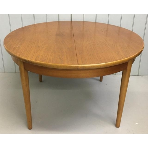 116 - A mid-century teak extending dining table. Dimensions(cm) H74, W122/160, D122.