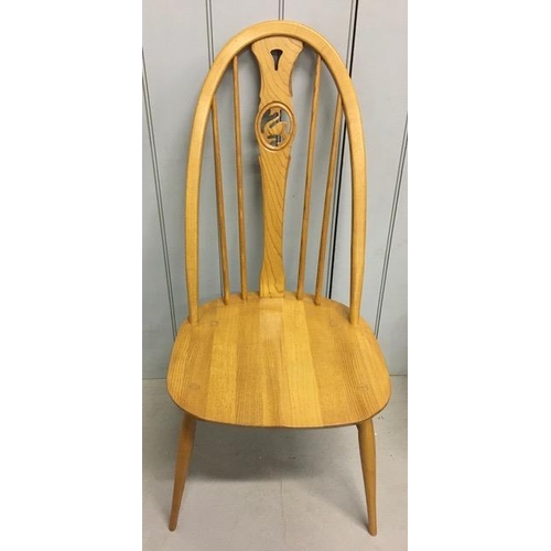 118 - A beautiful set of four Ercol, elm & beech, Swan-backed dining chairs. Complete with original, remov... 