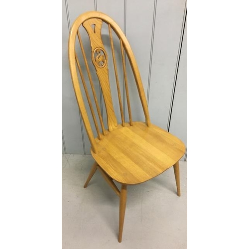 118 - A beautiful set of four Ercol, elm & beech, Swan-backed dining chairs. Complete with original, remov... 