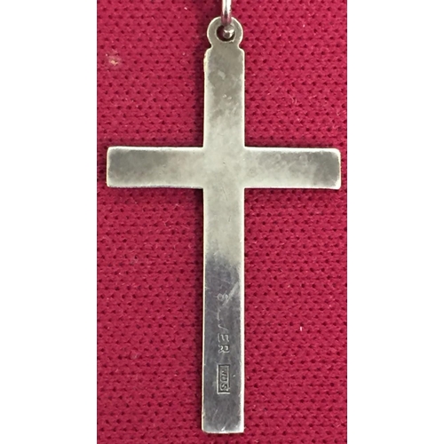 411 - A silver Cross & Chain. Cross hallmarked 'Silver WJS', chain hallmarked 'Sterling 830s'. Combined we... 