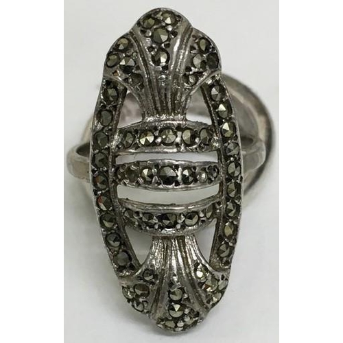 415 - A Portuguese silver ring (size N, total weight approximately 4.2g), together with two white metal ri... 