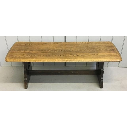 6 - An Ercol-style coffee table, with stretchered base. Dimensions(cm) H44, W122, D46.