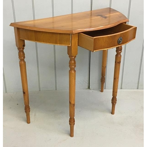 13 - A reproduction, Yew-veneered console table, with single drawer. Dimensions(cm) H75, W84, D40.