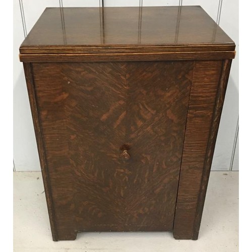 23C - An antique sewing machine cabinet.
Dimensions(cm) H79, W56/113, D42.