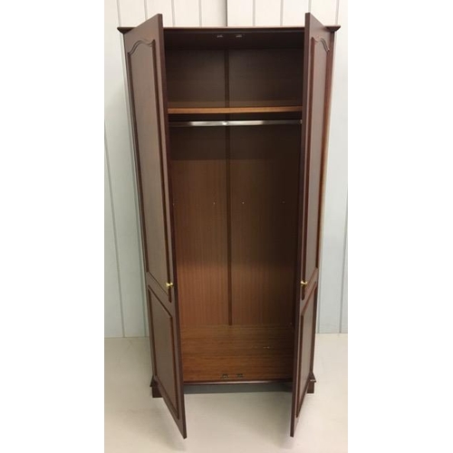 51 - A vintage double wardrobe, by Stag. Dimensions(cm) H187, W93, D59.