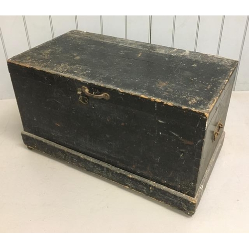 86 - An antique, ebonized pine trunk, with iron carry handles.
Dimensions(cm) H52, W92, D52