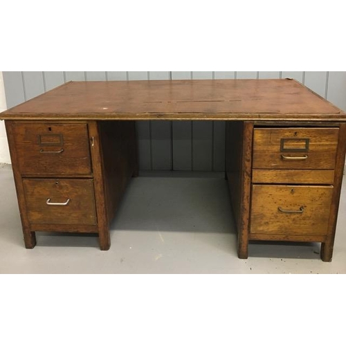 110 - A mid-century oak pedestal desk. Dimensions(cm) H72, W150, D90.