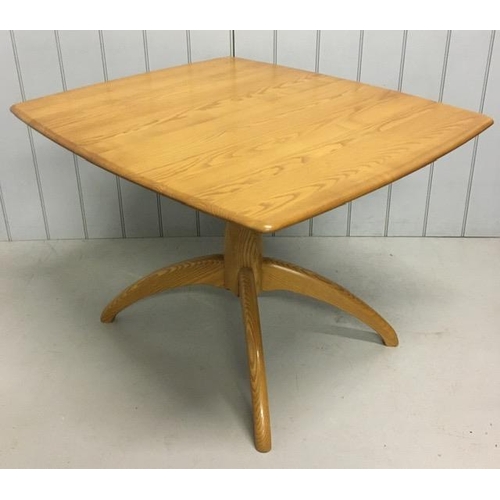 117 - An Ercol Windsor, extending pedestal dining table. Extension leaf housed on mechanism beneath table ... 