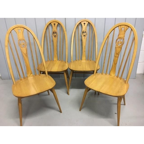 118 - A beautiful set of four Ercol, elm & beech, Swan-backed dining chairs. Complete with original, remov... 