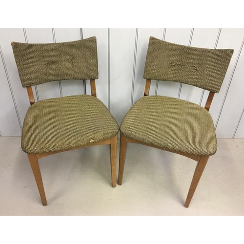 147B - A pair of mid-century teak dining chairs. Dimensions(cm) H76(45 to seat), W45, D40.