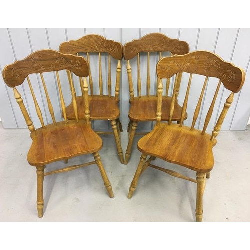 153 - A set of four stick-back chairs. Dimensions(cm) H91(43 to seat), W44, D41.