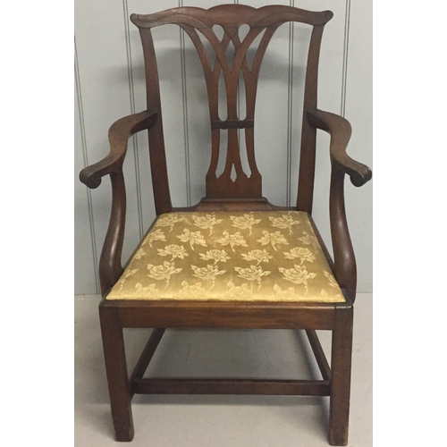 171 - A Chippendale-style fireside chair. Upholstered in gold coloured floral fabric. Dimensions(cm) H93(4... 