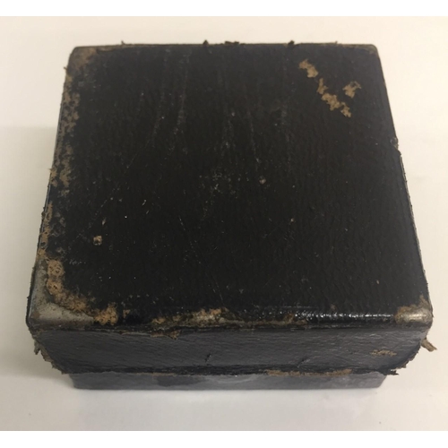 459 - An antique, leather-cased, travelling inkwell.