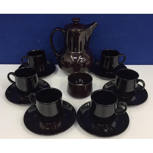 495 - A retro coffee set. Includes coffee pot, 6 cups, 6 saucers & sugar bowl.