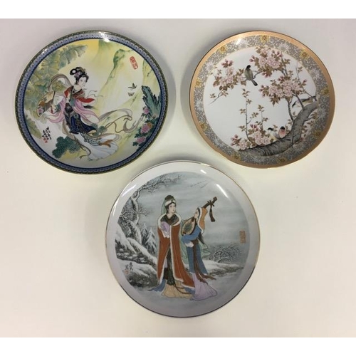 534 - Three oriental display plates.