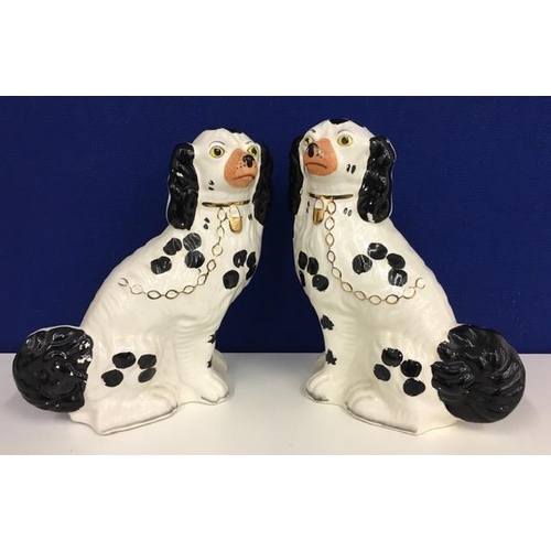 599 - A pair of 1960's, ceramic mantel dogs, attributed to Arthur Wood. Marked '4558' to base. Height 30cm... 