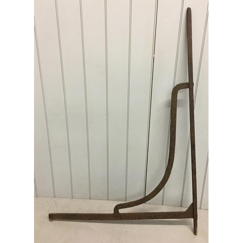 708 - A cast iron, swing-sign bracket support. 112cm x 153cm.