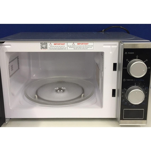 827 - A boxed Morphy Richards 800w silver coloured microwave oven. Model MM820C2LP(F)-PM. Tested & appears... 