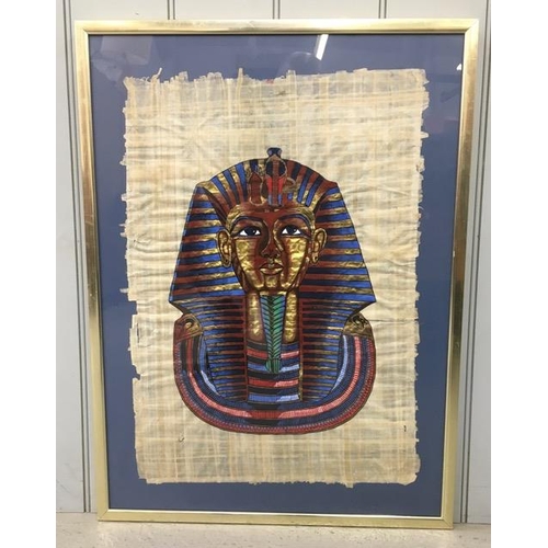 357 - A framed, Egyptian papyrus painting, depicting Tutankhamun. Framed dimensions(cm) 75x57.