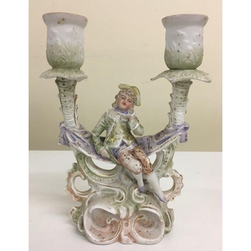 530 - A Dresden figurine, together with a vintage double candelabra/figurine. Both have damaged/missing fi... 