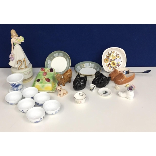 605 - A selection of ceramics, including Wedgwood bowls, Royal Doulton flowers in boot, Dartmouth swans, A... 