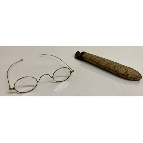 670 - A pair of antique spectacles, with original case.