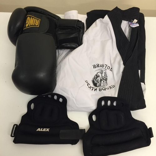 748W - A selection of sports/martial art items, including 'Ring Star gloves (label 10-02), a pair of 'Alex'... 