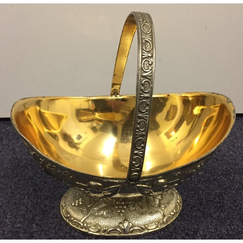 433 - A vintage, silver-plated oval basket, with embossed Cherub design.