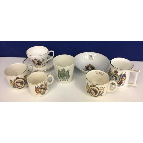 583 - A collection of Royal memorabilia. Includes George V coronation mug & Elizabeth II coronation mugs e... 