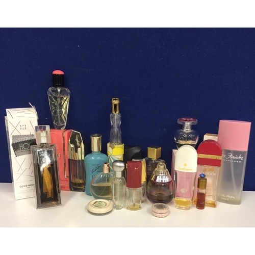 658 - A selection of perfume bottles from Elizabeth Arden, Estee Lauder, Yves Saint Lauren. All empty or p... 