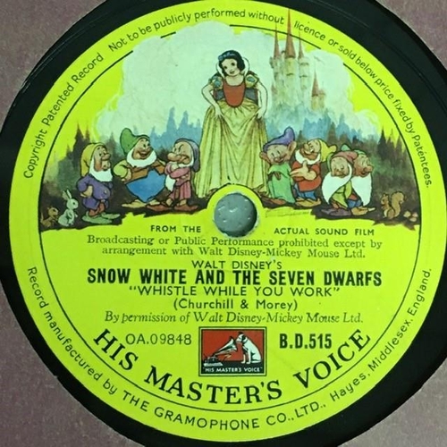 1699 - Two early, Walt Disney vinyl 78's. Snow White & The Seven Dwarfs & Mickey Mouse.