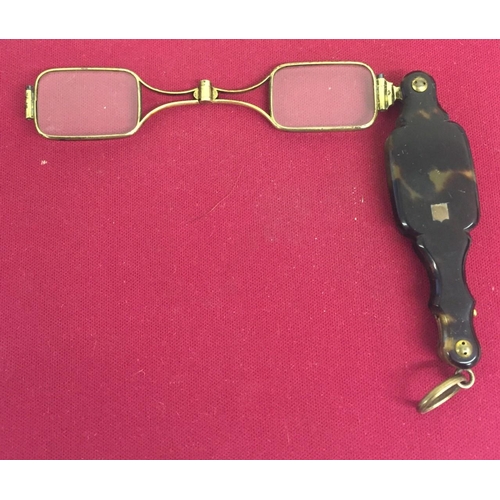 417 - A pair of silver/18ct gold plated, Victorian Lorgnette folding glasses. Spring in good working order... 