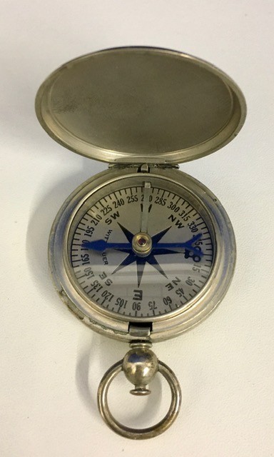 A boxed WWII USA pocket compass by Longines Wittnauer. Case