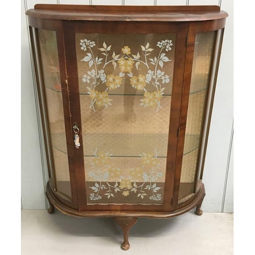 118 - A vintage, mahogany-veneered display cabinet, with floral decoration to doors. Two internal glass sh... 