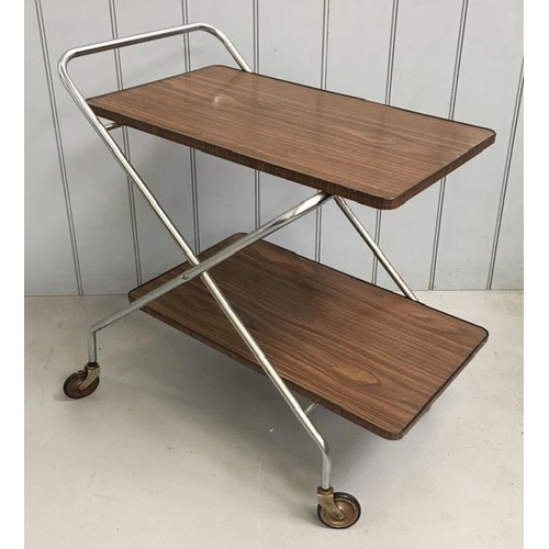 125 - A mid-century folding tea-trolley. Melamine trays, chrome frame on original castors. Dimensions(cm) ... 