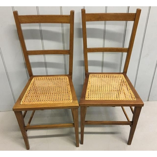 142 - A pair of Edwardian, mahogany inlaid side chairs, with bergere seats. Complete with later/removable ... 