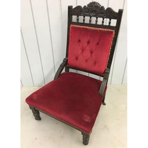 145D - An Edwardian library chair, upholstered in red fabric. Dimensions(cm) H101(34 to seat), W64, D69.