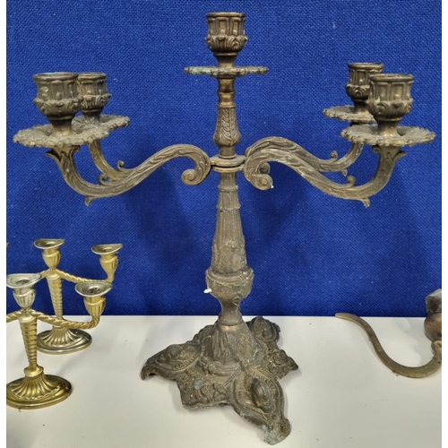 447 - A mixed lot of five metal vintage & antique candelabras & lamp. Notably a brass candelabra, with dol... 