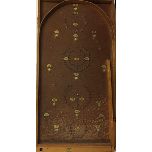 763 - A vintage Chad Valley tabletop bagatelle game, with original steel balls.