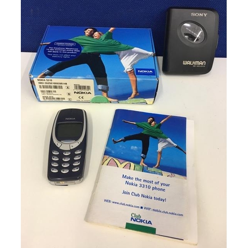 811 - An early Nokia 3310 mobile phone (with charger, original box & instructions), together with a Sony W... 