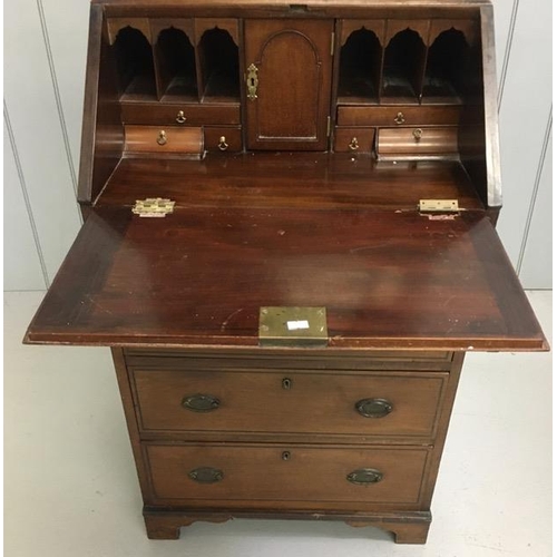 39 - A narrow, mahogany bureau bookcase. One key present. Fall front, fitted interior. Requires a little ... 