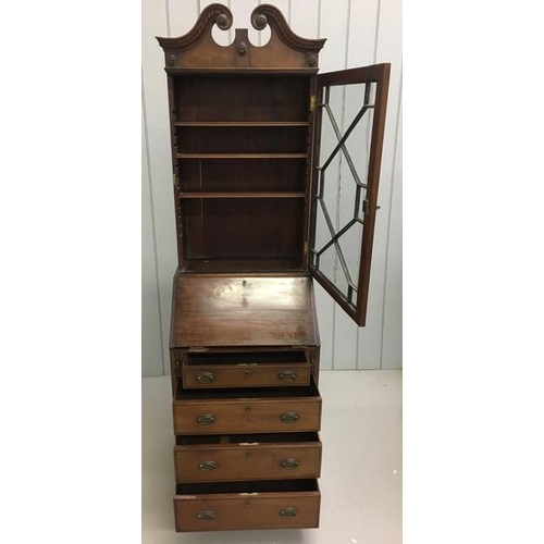 39 - A narrow, mahogany bureau bookcase. One key present. Fall front, fitted interior. Requires a little ... 