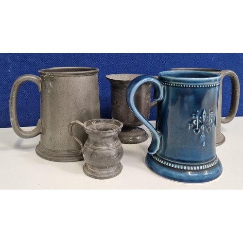 441 - A quantity of drinkware items featuring a rarer, local interest 'Prinknash' pottery blue glaze tanka... 