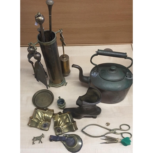 472 - A selection of copper & brassware. Includes a fireside companion set, kettle, large boot, set of dar... 