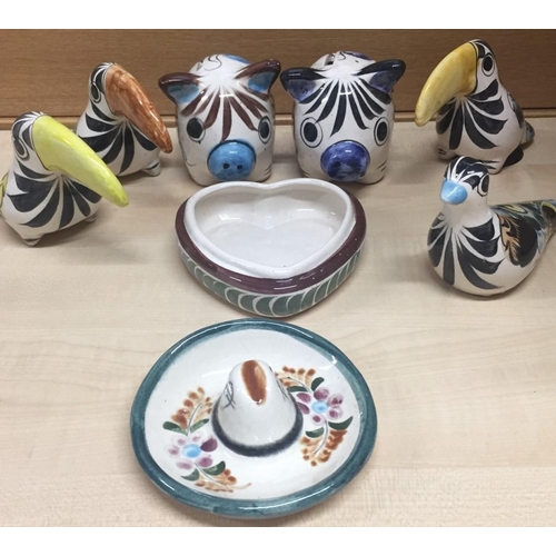 518 - A collection of Mexican folkart ceramics. Includes four birds, two pigs etc.