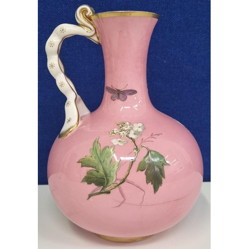 523A - A mid/late 19th 
century 'Minton' pink ground vase. A single-handled, ornately gilded example, with ... 