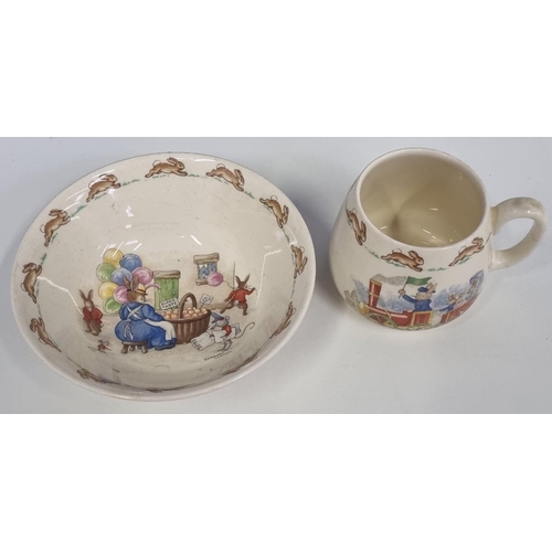 547C - An eclectic assortment of cups and saucers, most notably an early Emma Bridgewater hand-painted 'Wat... 