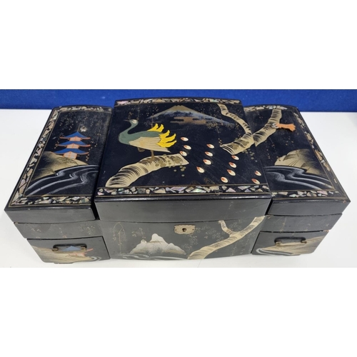 651 - A larger size, inlaid mother of pearl, Japanese black lacquerware jewellery box. Rectangular shape w... 