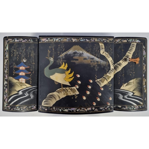 651 - A larger size, inlaid mother of pearl, Japanese black lacquerware jewellery box. Rectangular shape w... 